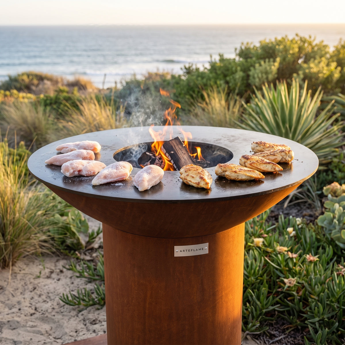 Arteflame wood-fired flat-top grill with round Corten steel base: Grilling Frozen Chicken