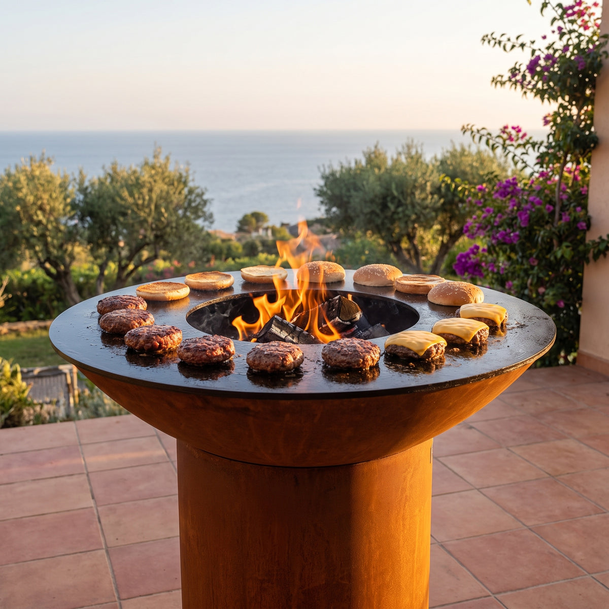 Arteflame wood-fired flat-top grill with round Corten steel base: Grill Juicy Burgers