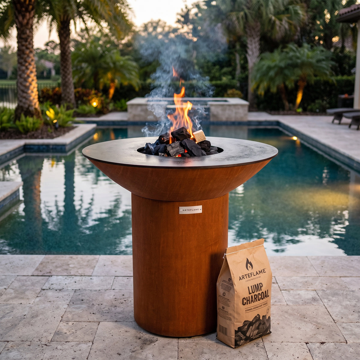 Arteflame wood-fired flat-top grill with round Corten steel base: Start a Charcoal Grill