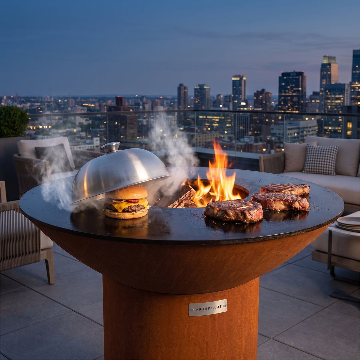 Arteflame wood-fired flat-top grill with round Corten steel base: Grilling With a Lid