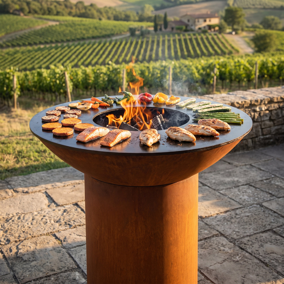 Arteflame wood-fired flat-top grill with round Corten steel base: Grilling for the Whole Food Diet