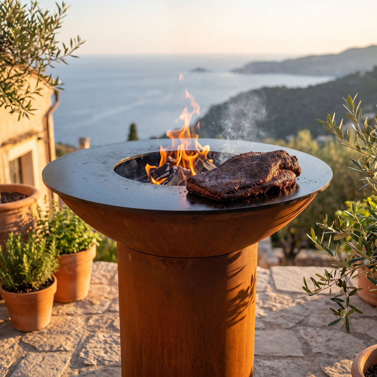 Wood-fired brisket with a peppery bark on an Arteflame wood-fired flat-top grill with a round Corten steel base