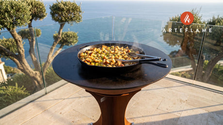 Wood-Fired Thanksgiving Skillet Stuffing cooking on an Arteflame grill