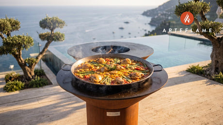 Paella Valenciana cooking on an Arteflame grill