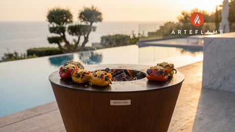 Grilled Stuffed Bell Peppers cooking on an Arteflame grill