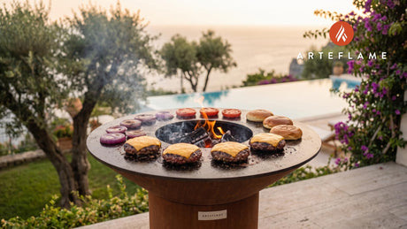 Juicy Wagyu Burgers Seared in Duck Fat cooking on an Arteflame grill