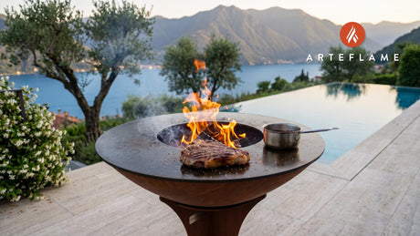 Seared Porterhouse Steak with Port Wine Reduction cooking on an Arteflame grill