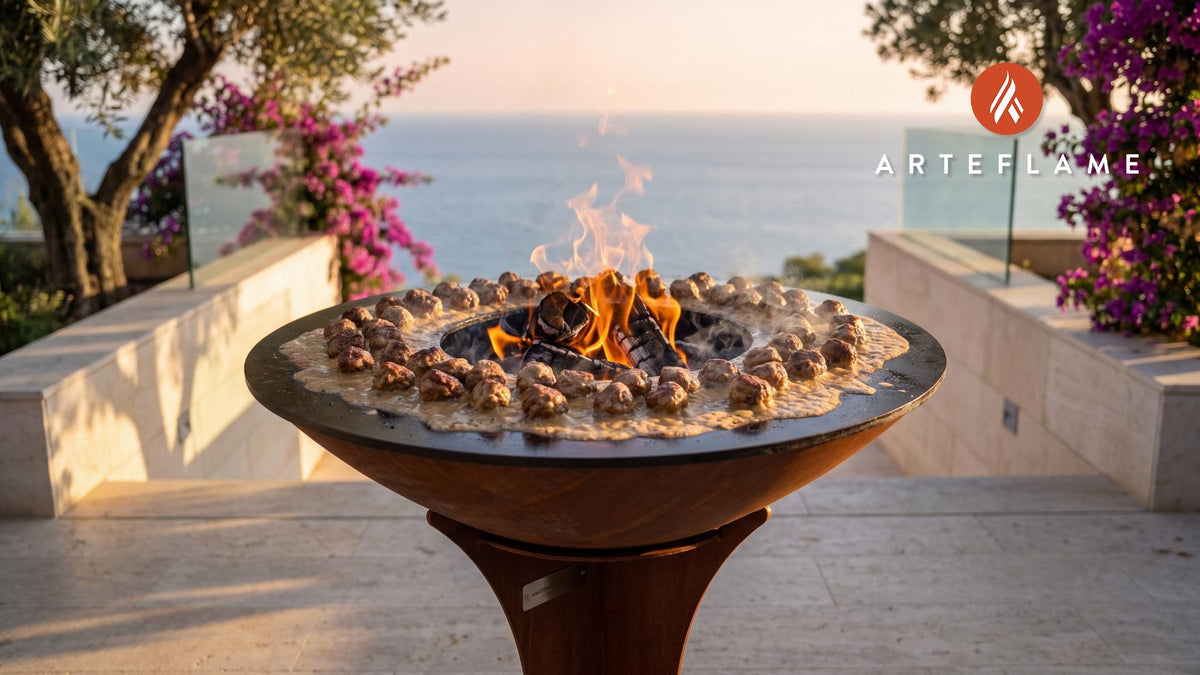 Wood-Fired Swedish Meatballs with Creamy Sauce cooking on an Arteflame grill