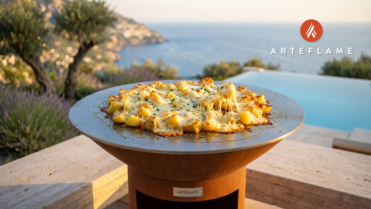 Grilled Cheese Potatoes (French Aligot Style) cooking on an Arteflame grill