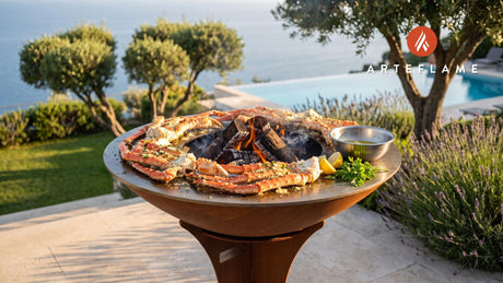 Grilled Alaska King Crab Legs with Garlic Butter cooking on an Arteflame grill