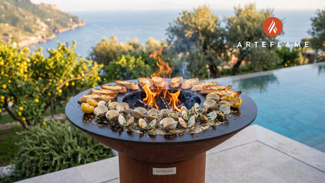 Grilled Alaska Clams cooking on an Arteflame grill