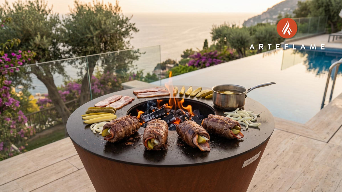 Charred Beef Rolls with Pickles (Polish Style) cooking on an Arteflame grill