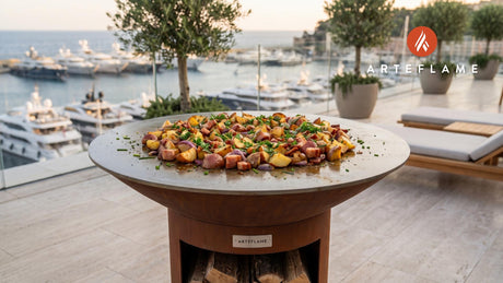 Grilled Potato Salad with Crispy Bacon (Polish Style) cooking on an Arteflame grill