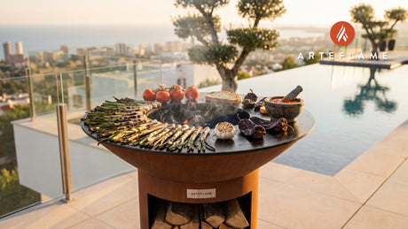 Charred Spanish Calcots with Romesco Sauce cooking on an Arteflame grill