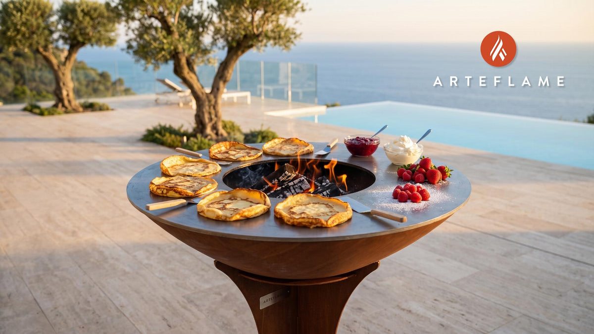 Grilled Swedish Pancakes with Lingonberry Jam cooking on an Arteflame grill