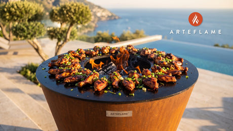 Smoked BBQ Chicken Wings (Kansas Style) cooking on an Arteflame grill