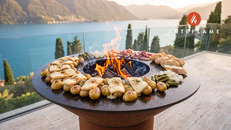 Grilled Raclette Potatoes cooking on an Arteflame grill