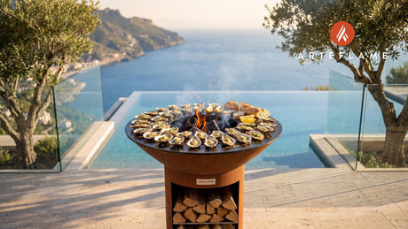 Herb-Infused Grilled Oysters (Massachusetts Style) cooking on an Arteflame grill