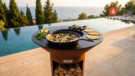 Charred Green Chile Queso Fundido (New Mexico Style) cooking on an Arteflame grill