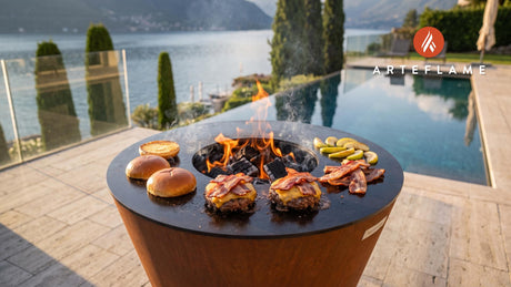 Juicy Maple Bacon Burger with Vermont Cheddar cooking on an Arteflame grill