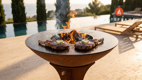Steakhouse-Style Grilled Ribeye Steak with Garlic Herb Butter cooking on an Arteflame grill