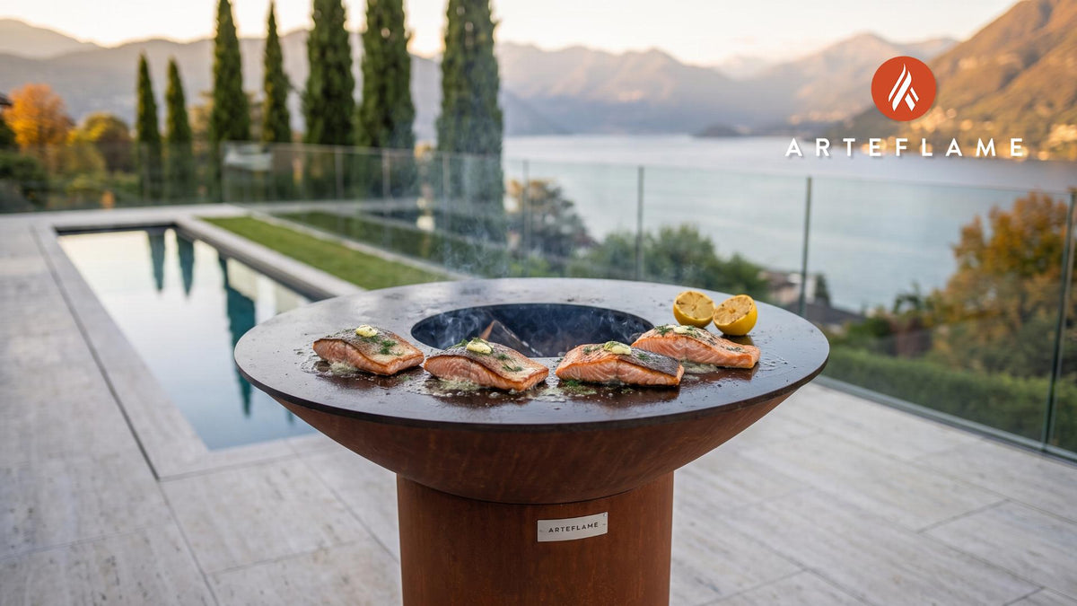 Crispy-Skin Salmon with Charred Lemon Dill Butter cooking on an Arteflame grill