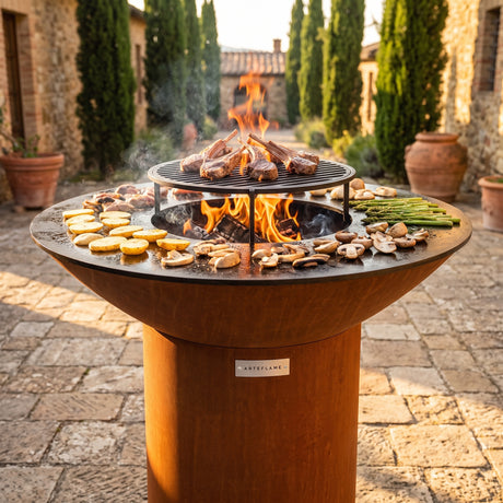 Arteflame wood-fired flat-top grill with round Corten steel base: Upgrade DCS Grill Grates