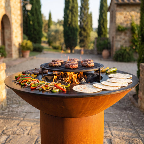 Arteflame wood-fired flat-top grill with round Corten steel base: Griddles vs Grates