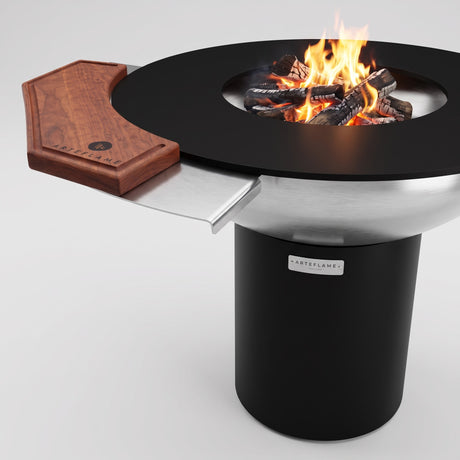Arteflame rosewood cutting board on the side table bracket of a 40-inch Platinum Series stainless steel grill with black base