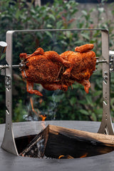Versatile rotisserie cooking on a grill.