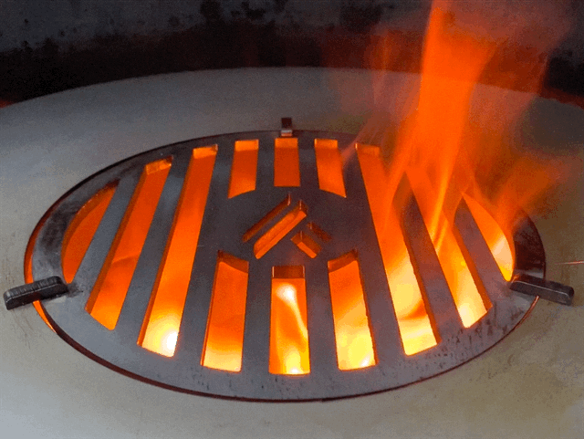 heating up the grill grateArteflame Carbon Steel Grill Grate in use